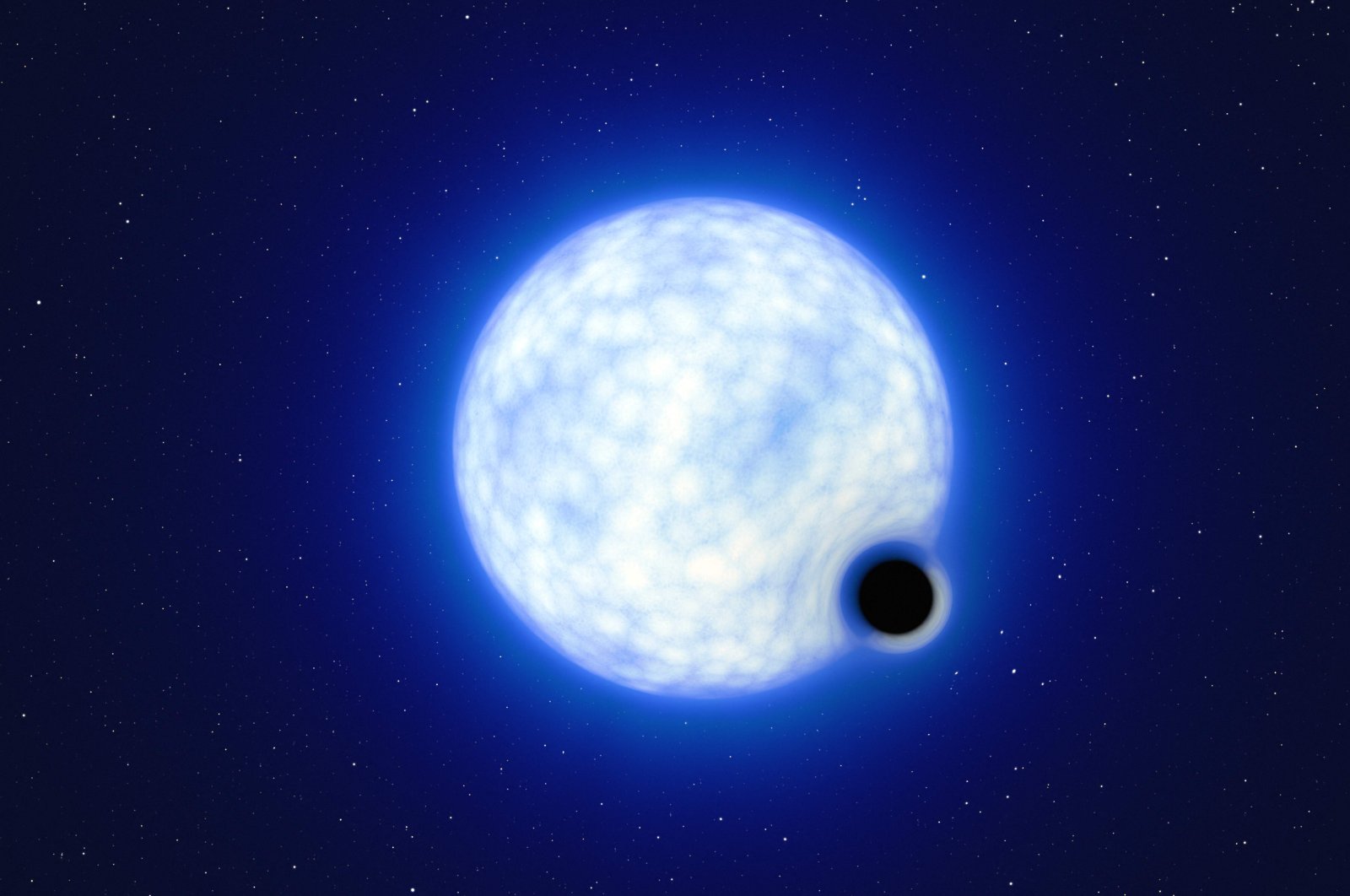 This handout artist’s impression released by The European Southern Observatory (ESO) shows the binary system VFTS 243 composed of a blue star with 25 times the sun’s mass and a black hole. (Photo by European Southern Observatory via AFP)