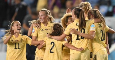 Belgium players celebrate beating Italy in the UEFA Women's Euro 2022, Manchester, England, July 18, 2022. (AFP Photo)