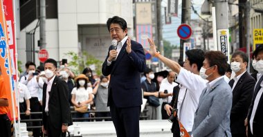 Former Japanese Prime Minister Shinzo Abe makes a speech before he was shot from behind by a man in Nara, western Japan, July 8, 2022. (The Asahi Shimbun via Reuters)