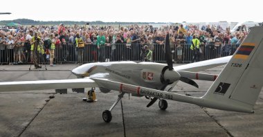 A Turkish Bayraktar TB2 combat drone is on view during a presentation at the Lithuanian Air Force Base in Siauliai, Lithuania, July 6, 2022. (AFP Photo)