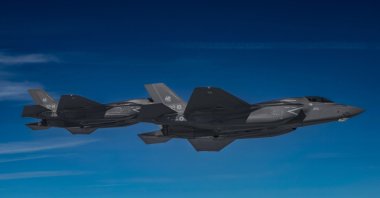 Two Italian Air Force F-35A multirole combat aircraft fly at an undisclosed location during the NATO-led defense operation "Air Policing Northern Lightning III" from the Keflavik Air Base in Iceland, June 27, 2022. (EPA Photo)