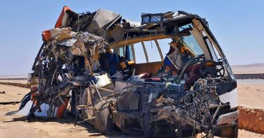 A picture shows what remains of a bus after it crashed into a truck on a road in al-Minya Governorate, south of the Egyptian capital Cairo, Egypt, July 19, 2022. (AFP Photo)