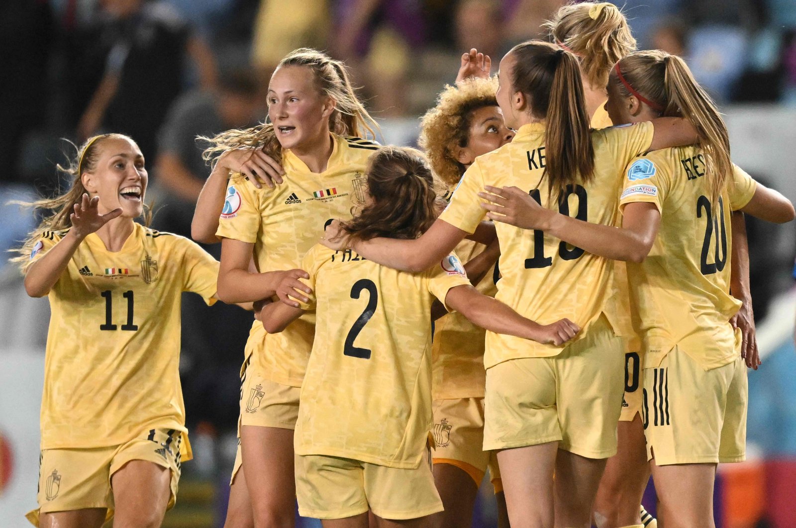 Belgium players celebrate beating Italy in the UEFA Women&#039;s Euro 2022, Manchester, England, July 18, 2022. (AFP Photo)