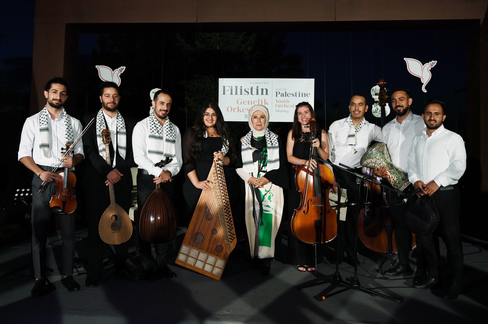 First lady Emine Erdoğan (C) poses with some members of the Palestinian Youth Orchestra, Presidential Complex, Ankara, Turkey, July 18, 2022. (AA)