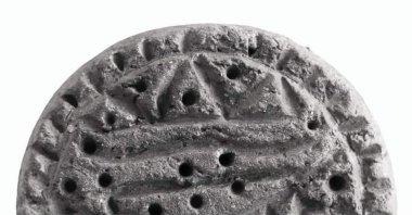 A 3,300-year-old seal and a dagger were unearthed during the excavations at Tavşanlı Mound located in the central Turkish province of Kütahya, Turkey, July 19, 2022. (DHA Photo)