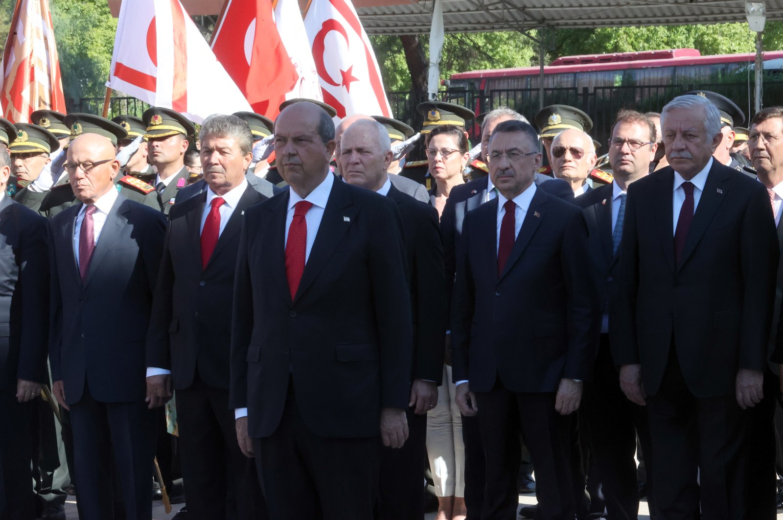 Turkish Cypriot President Ersin Tatar (front) and Turkish Vice President Fuat Oktay (R-2) lay wreaths to the Atatürk Monument in the capital Lefkoşa (Nicosia), TRNC, July 20, 2022. (AA Photo)