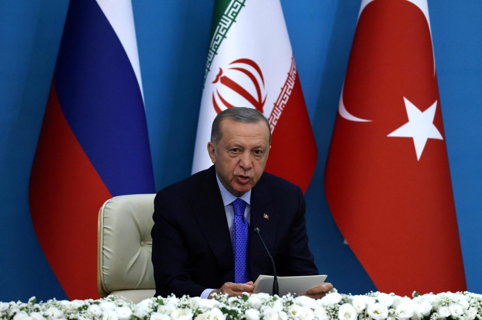 President Recep Tayyip Erdoğan speaks during a joint press conference with his Iranian and Russian counterparts following their summit in Tehran, Iran, July 19, 2022. (AFP)