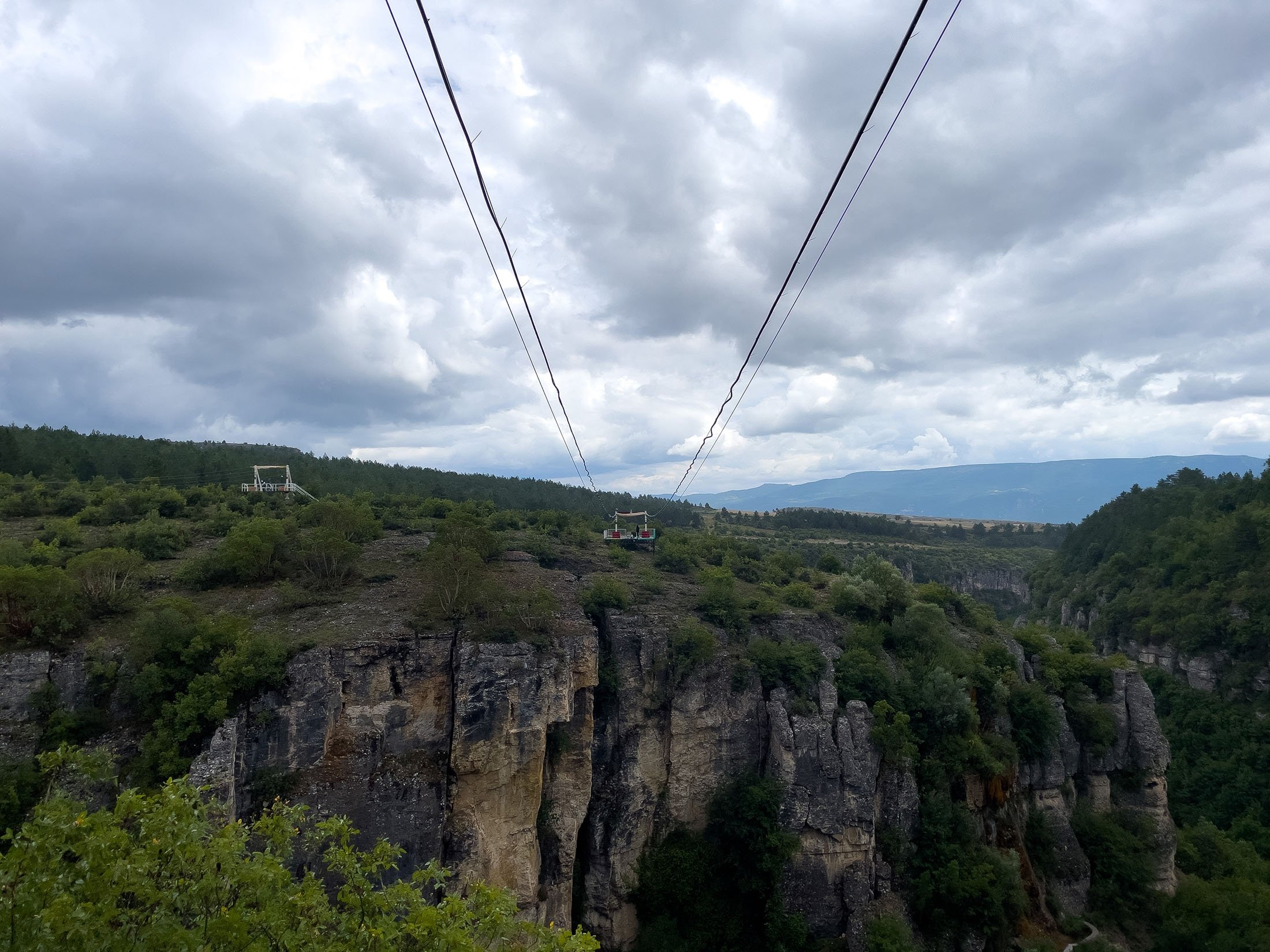 A zipline goes across a canyon in Safranbolu, Karabük, northern Turkey, July 10, 2022. (Photo by Ahmet Koçak)
