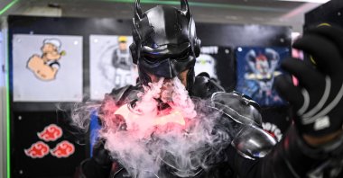 A man wears a Batman costume while performing at the Comic-Con convention in Caracas, Venezuela, July 17, 2022. (AFP Photo)