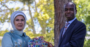 First lady Emine Erdoğan (L) receives the award from World Bank Country Director for Turkey Auguste Tano Kouame, in the capital Ankara, Turkey, July 21, 2022. (AA PHOTO) 