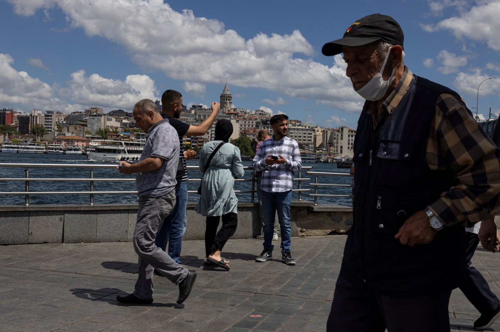 People walk near Eminönü pier in Istanbul, Turkey, July 20, 2022. (Reuters Photo) 