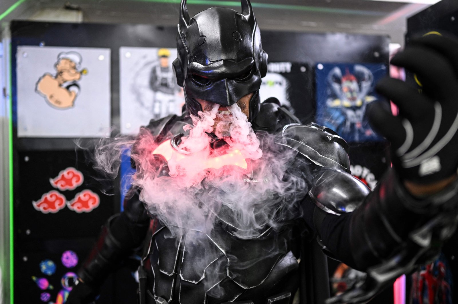 A man wears a Batman costume while performing at the Comic-Con convention in Caracas, Venezuela, July 17, 2022. (AFP Photo)