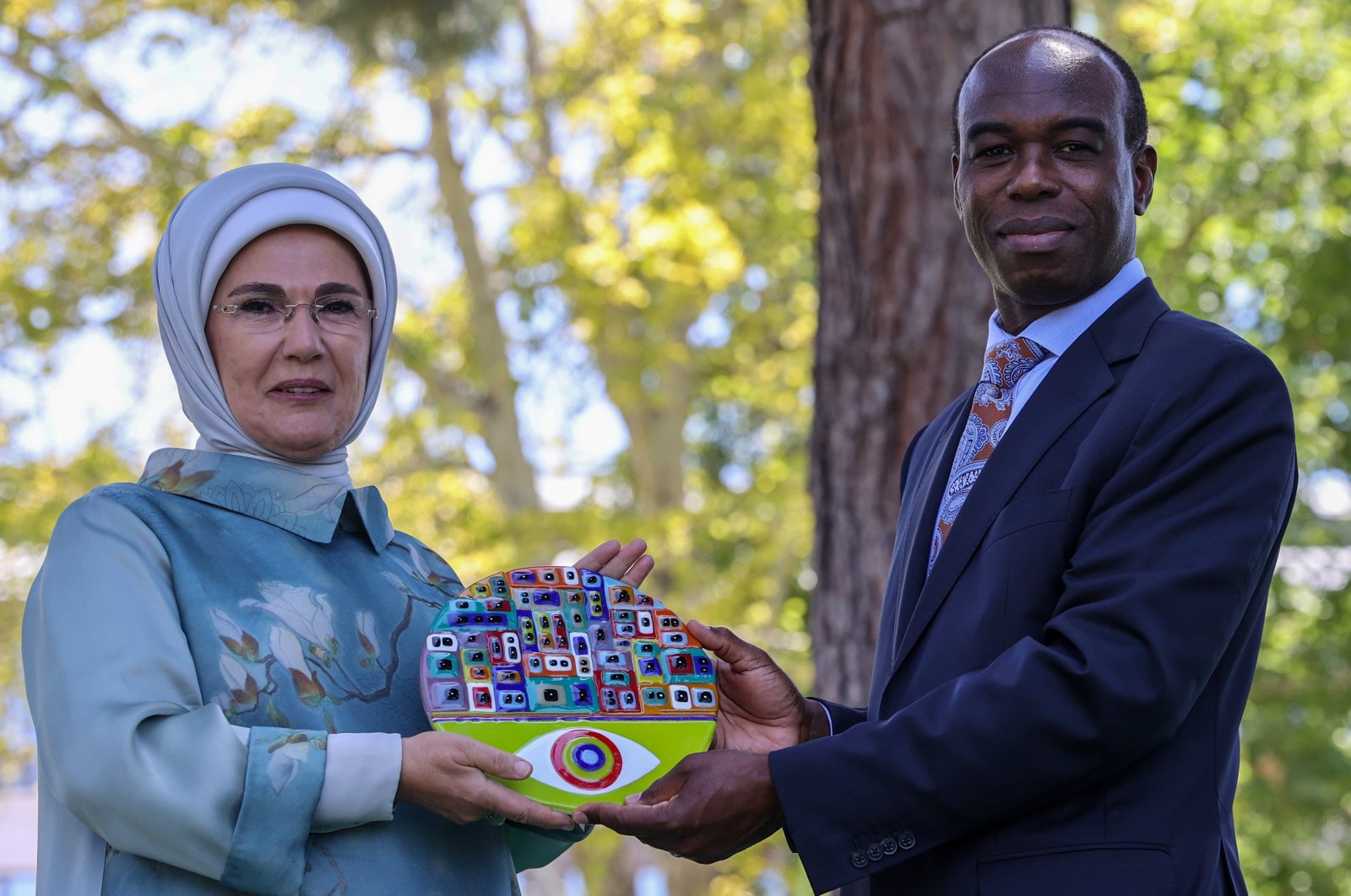 First lady Emine Erdoğan (L) receives the award from World Bank Country Director for Turkey Auguste Tano Kouame, in the capital Ankara, Turkey, July 21, 2022. (AA PHOTO) 