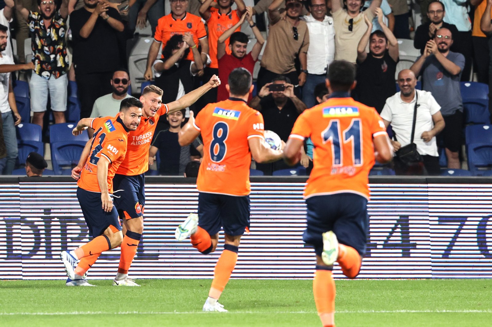 Medipol Başakşehir&#039;s Patryk Szysz celebrates with team mates after scoring a goal against Maccabi Netanya at Fatih Terim Stadium in Istanbul, Turkey, July 21, 2022. (AA Photo)