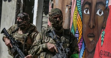 Members of the military police carry out an operation against organized crime, at the Alemao favela, north of Rio de Janeiro, Brazil, July 21, 2022. (EPA-EFE Photo)