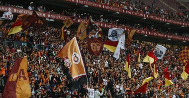 Galatasaray fans cheer during a match against Adana Demirspor, in Istanbul, Turkey, May 16, 2022. (AA PHOTO)