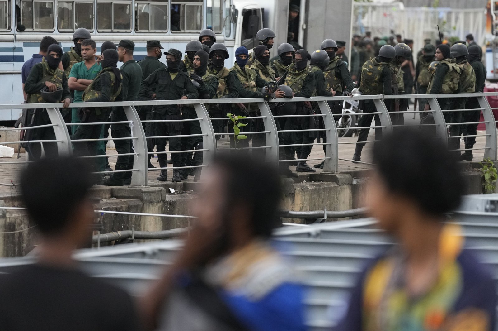 Army soldiers stand guard near a barricade following an eviction of protesters from the presidential secretariat premise in Colombo, Sri Lanka, July 22, 2022. (AP Photo)