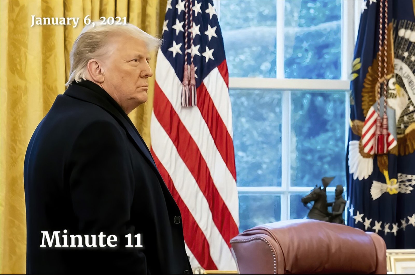 This exhibit from video shows a photo of U.S. President Donald Trump as he arrived at the Oval Office after his speech at the rally on the Ellipse on Jan. 6, displayed at a hearing by the House select committee investigating the Jan. 6 attack on the U.S. Capitol, Washington, U.S., July 21, 2022. (House Select Committee via AP)