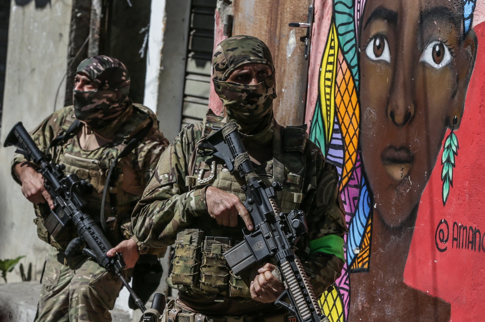Members of the military police carry out an operation against organized crime, at the Alemao favela, north of Rio de Janeiro, Brazil, July 21, 2022. (EPA-EFE Photo)