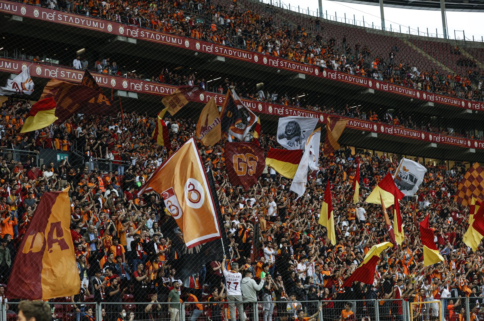 Galatasaray fans cheer during a match against Adana Demirspor, in Istanbul, Turkey, May 16, 2022. (AA PHOTO)