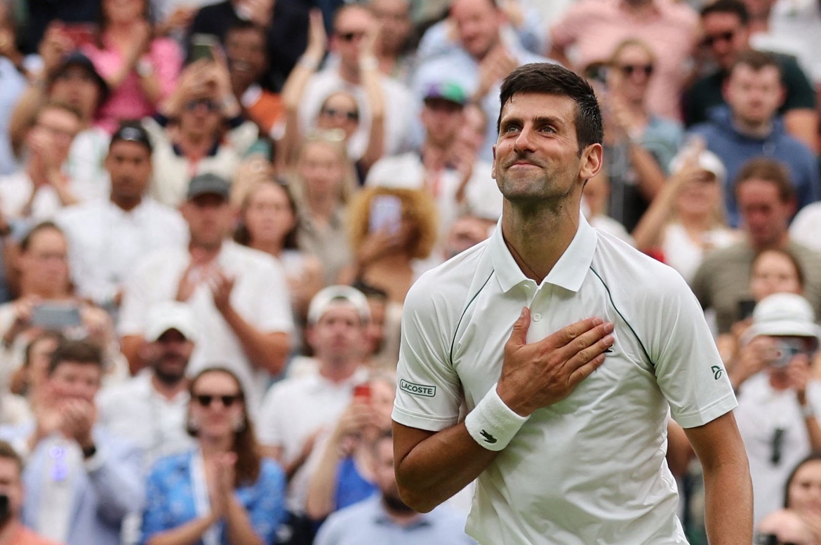Novak Djokovic celebrates beating South Korea&#039;s Kwon Soon-woo in a match in Wimbledon, London, June 27, 2022. (AFP PHOTO)