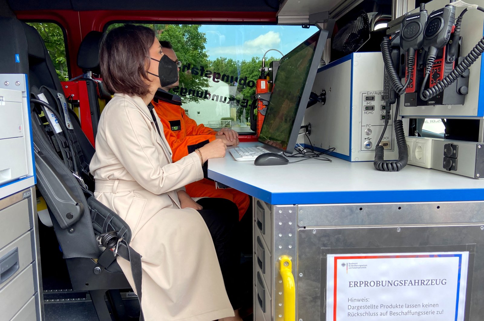 German Foreign Minister Annalena Baerbock sits in a civil society protection vehicle, in Bad Neuenahr, Germany, July 16, 2022. (Reuters Photo)