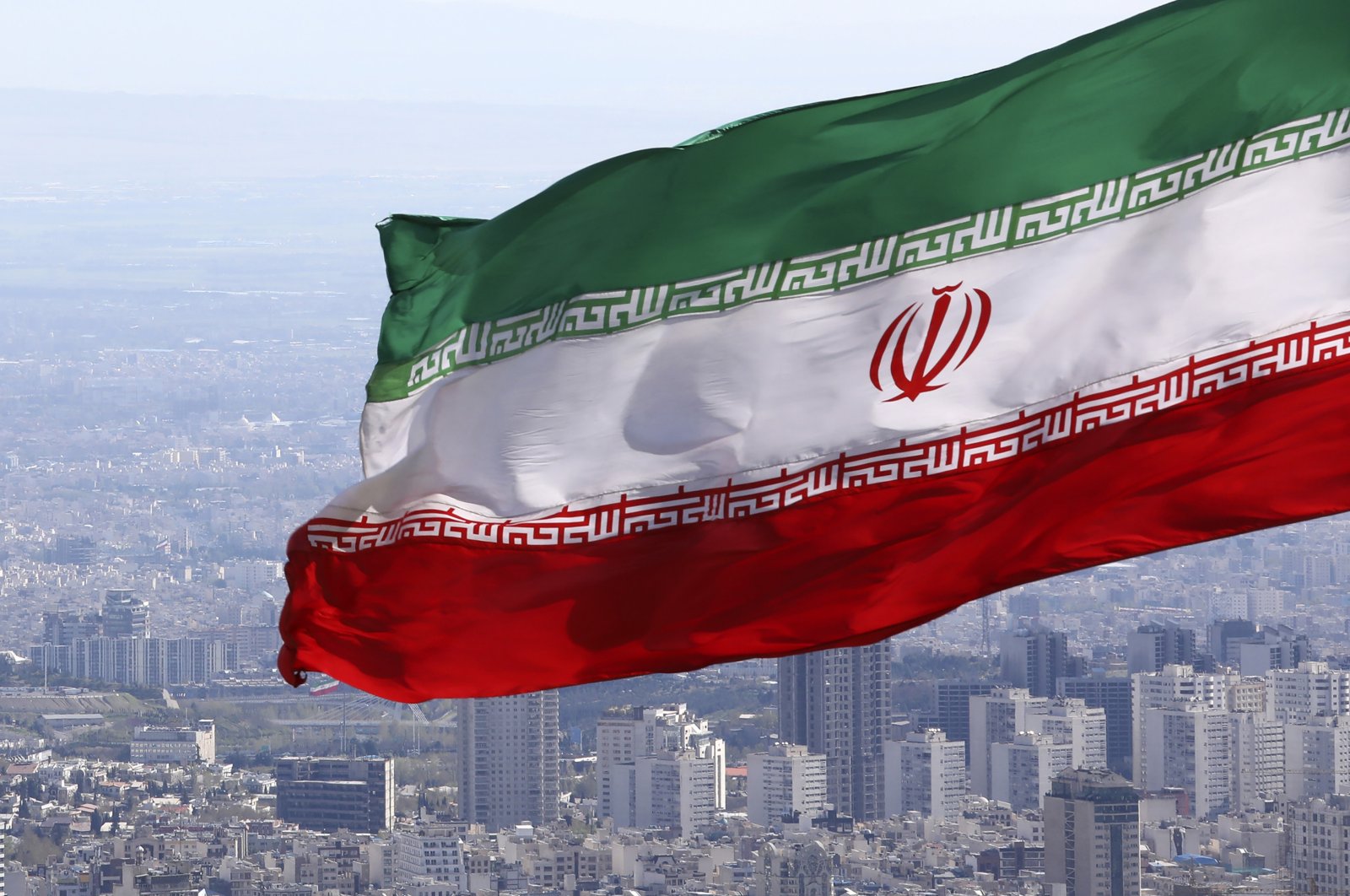 Iran&#039;s national flag waves in Tehran, Iran, March 31, 2020. (AP Photo)
