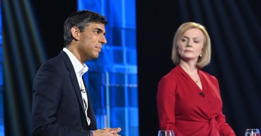Conservative leadership candidates Rishi Sunak and Liz Truss (R) during a TV debate at Riverside Studios in London, Britain, July 17, 2022. (EPA Photo)