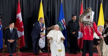 Pope Francis along with Canada's Prime Minister Justin Trudeau and Governor General of Canada Mary Simon, waits to greet Indigenous dignitaries after he arrives at the Edmonton International Airport near Edmonton, Alberta, Canada July 24, 2022. (Reuters Photo)