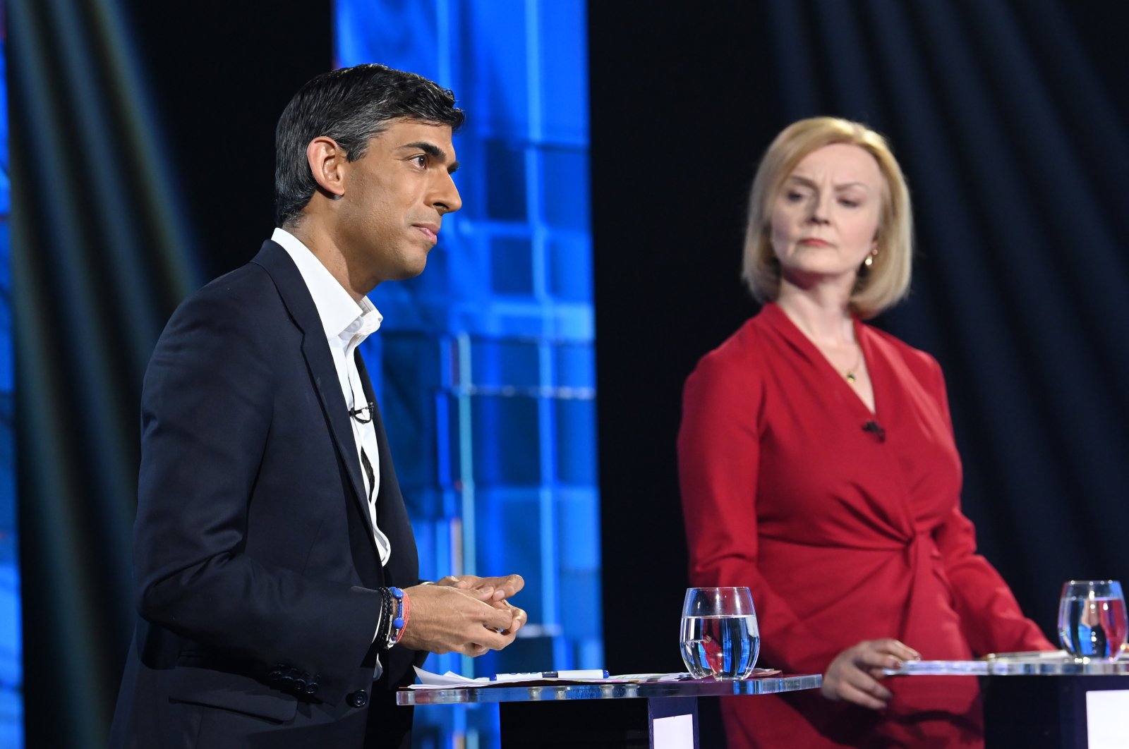 Conservative leadership candidates Rishi Sunak and Liz Truss (R) during a TV debate at Riverside Studios in London, Britain, July 17, 2022. (EPA Photo)