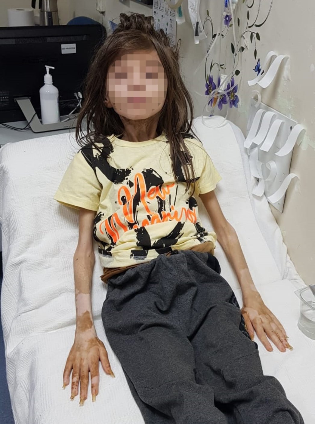 A 9-year-old boy found in the hoarder's house, Bursa, Turkey, July 25, 2022. (DHA Photo)