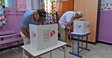 Tunisians vote in a referendum on a draft constitution put forward by the country's president, at a polling station in the capital Tunis, Tunisia, July 25, 2022. (AFP Photo)