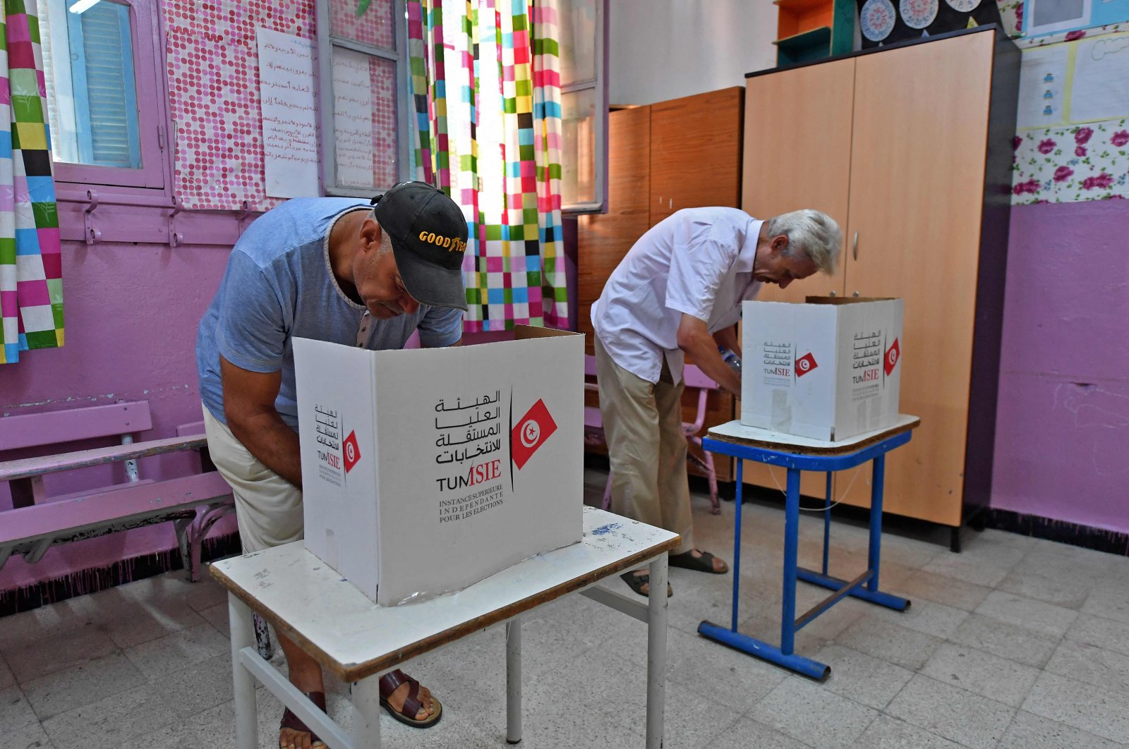 Tunisians vote in a referendum on a draft constitution put forward by the country&#039;s president, at a polling station in the capital Tunis, Tunisia, July 25, 2022. (AFP Photo)