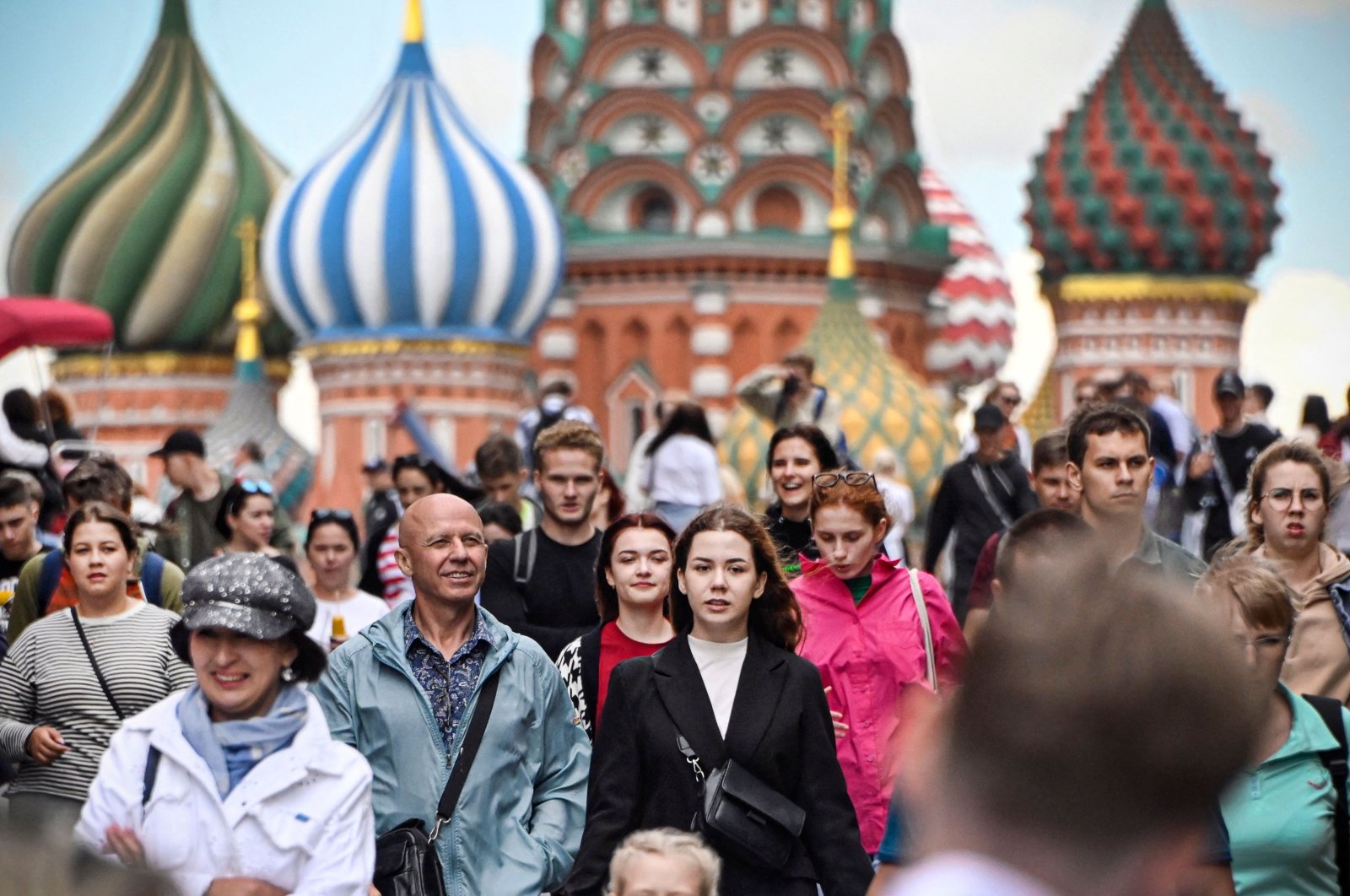People walk along Red Square in front of St. Basil&#039;s Cathedral, Moscow, Russia, July 19, 2022. (AFP Photo)