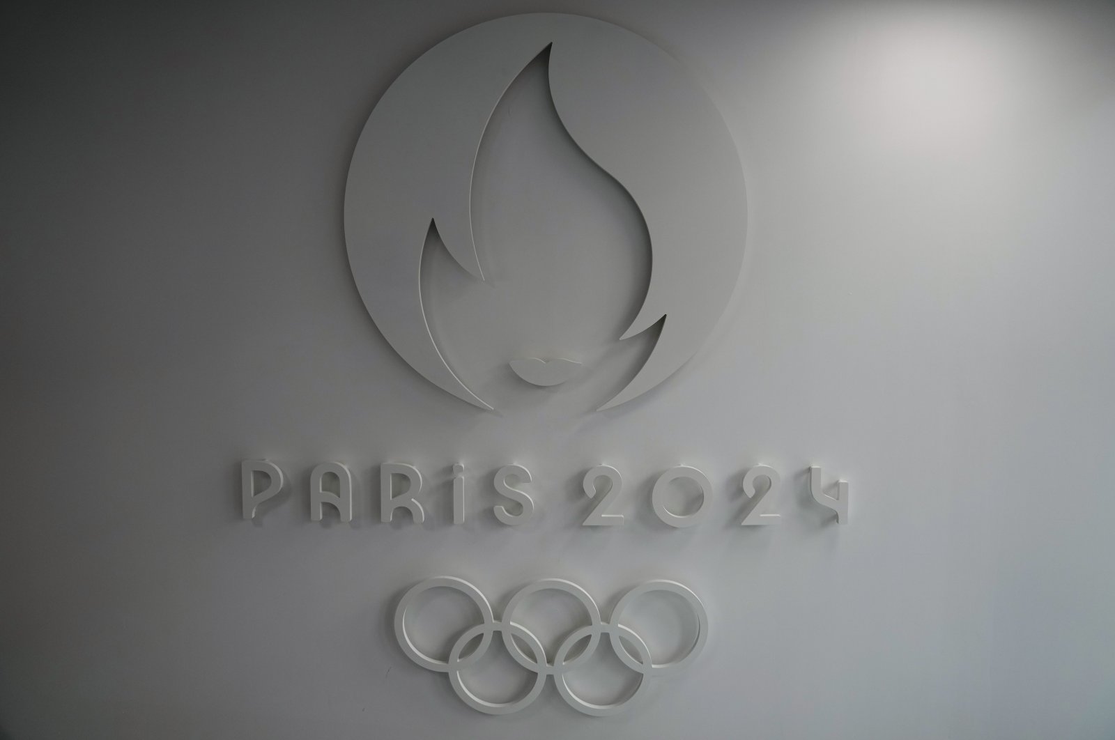 The logo of the Paris 2024 Organizing Committee is seen at the headquarters in Saint-Denis, Paris, Oct.14, 2021. (AP Photo)