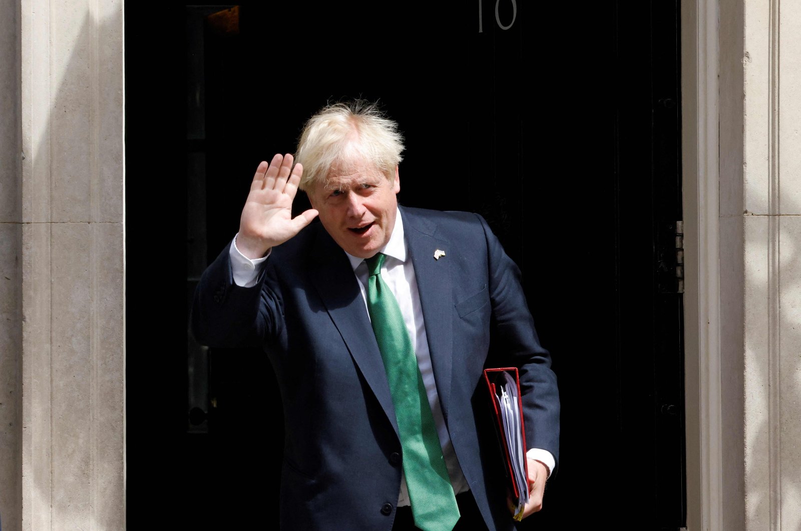 Britain&#039;s Prime Minister Boris Johnson walks to a waiting car as he leaves 10 Downing Street in central London, U.K., July 13, 2022. (AFP Photo)