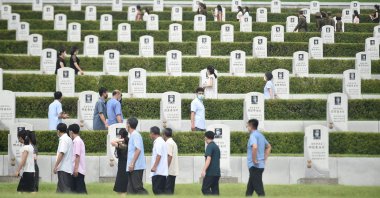 People visit the Fatherland Liberation War Martyrs Cemetery in Pyongyang, North Korea, July 21, 2022. (AFP Photo)