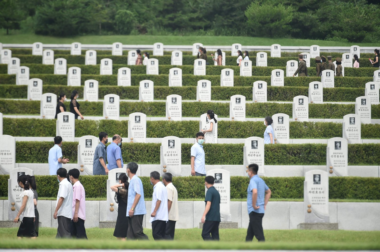 People visit the Fatherland Liberation War Martyrs Cemetery in Pyongyang, North Korea, July 21, 2022. (AFP Photo)