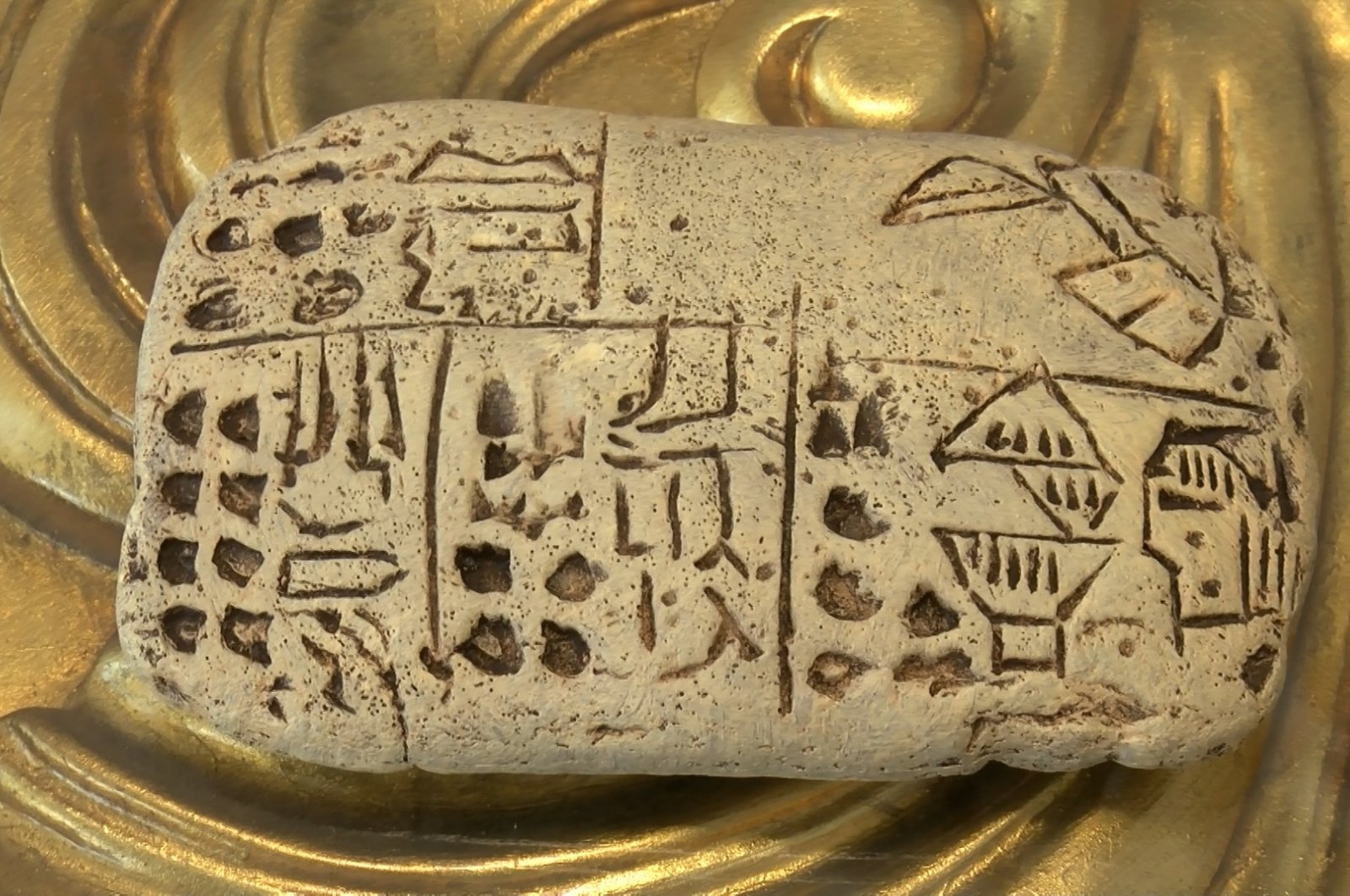 One of the scent formulas by the world&#039;s first female perfumer Tapputi engraved in Akkadian on a clay tablet, Istanbul, Turkey, July 24, 2022. (DHA Photo)