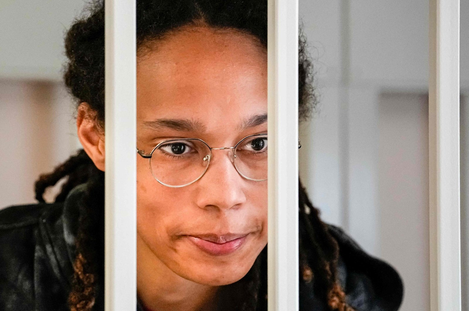 U.S. WNBA basketball superstar Brittney Griner looks from inside a defendants&#039; cage before a hearing at the Khimki Court, Moscow, Russia, July 26, 2022. (AFP Photo)