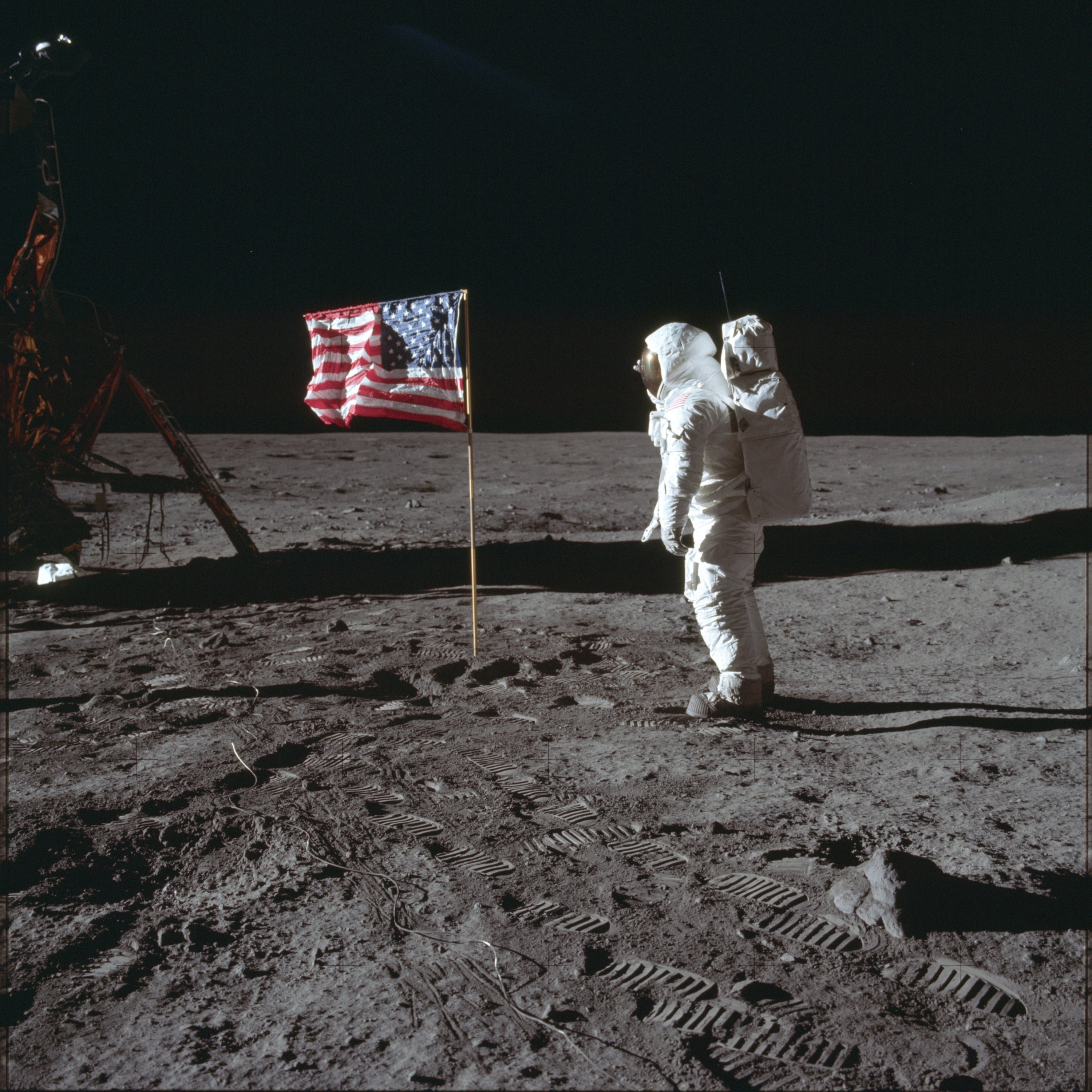 In this July 20, 1969 photo made available by NASA, astronaut Buzz Aldrin Jr. poses for a photograph beside the U.S. flag on the moon during the Apollo 11 mission. (AP) 