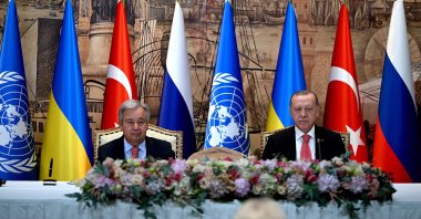 President Recep Tayyip Erdoğan and U.N. Secretary-General Antonio Guterres (L) sit at the start of the signature ceremony of an initiative on the safe transportation of grain and foodstuffs from Ukrainian ports, in Istanbul, Turkey, July 22, 2022. (AFP Photo)