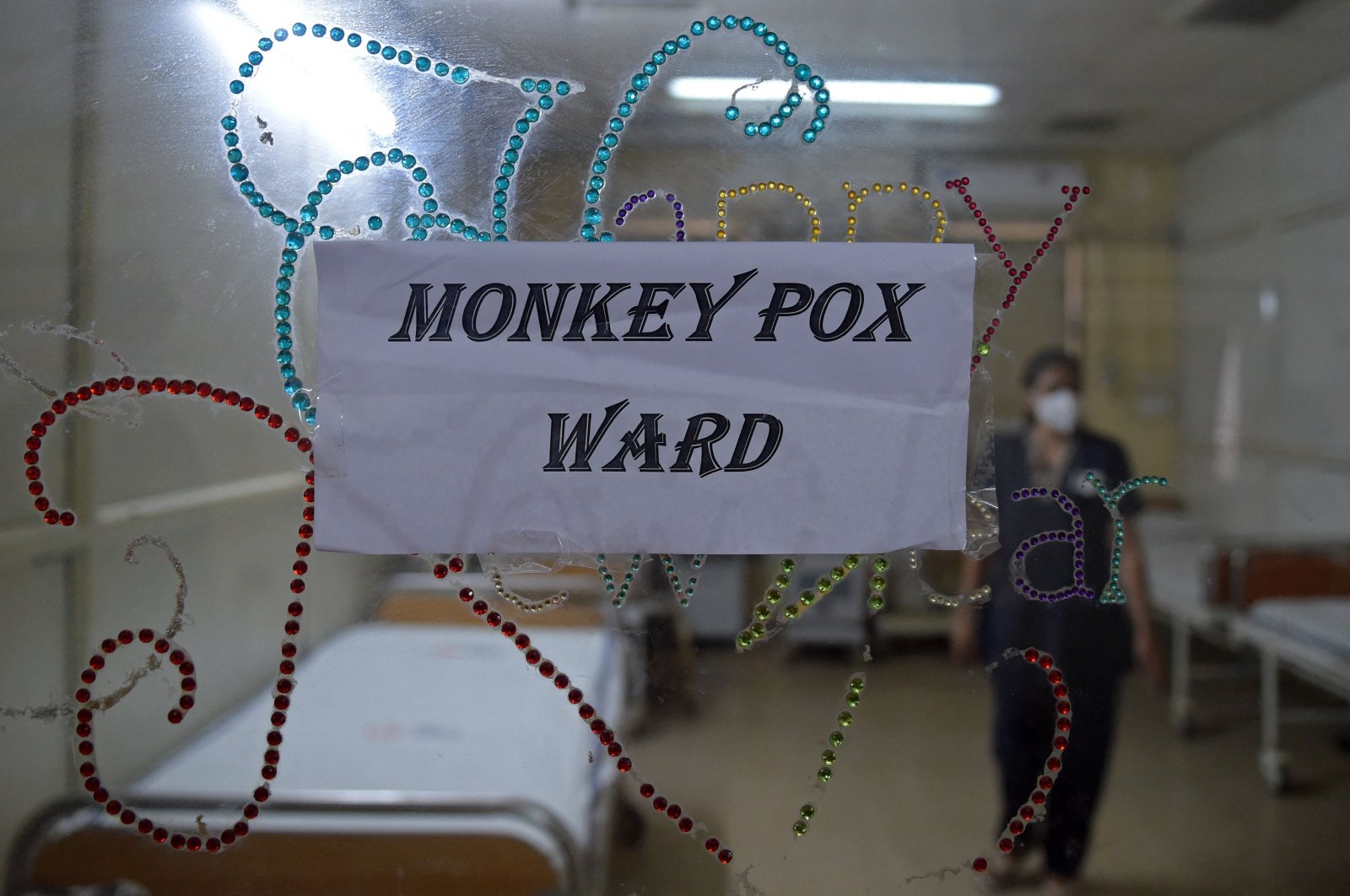A health worker walks inside an isolation ward built as a precautionary measure for the monkeypox patients at a civil hospital in Ahmedabad, India, July 25, 2022. (AFP Photo)