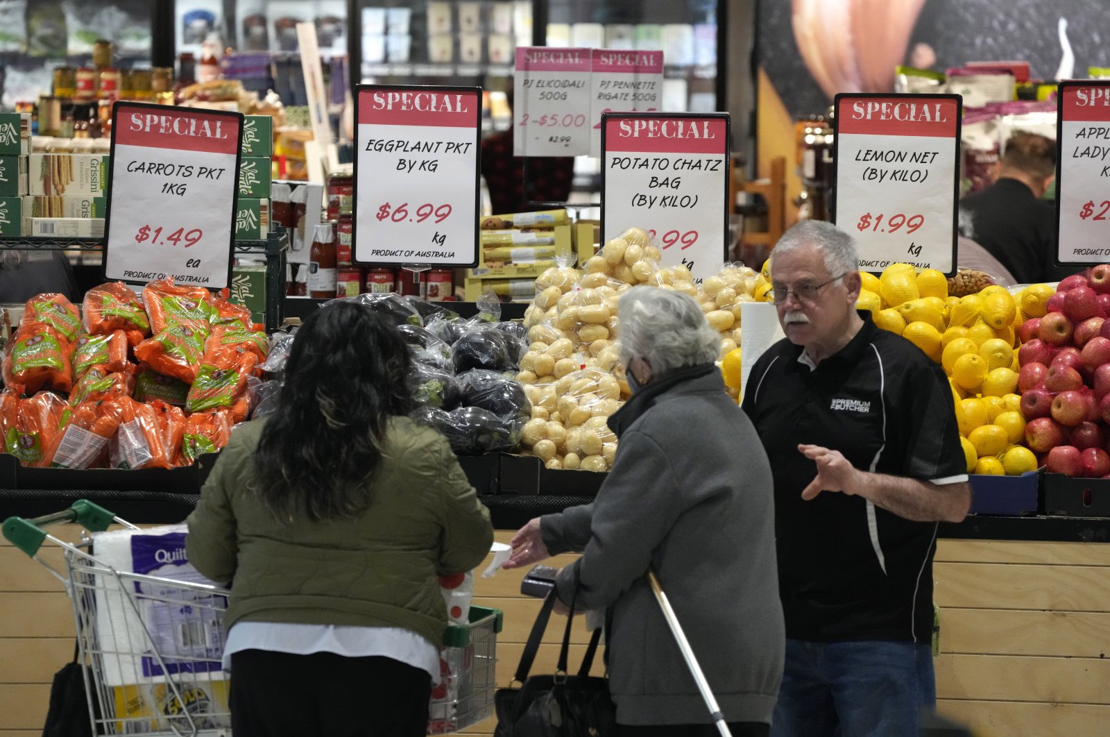 Shoppers look at produce at a shopping center in Sydney, Australia, July 27, 2022. (AP Photo)