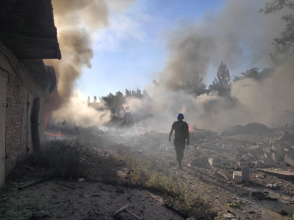 A rescuer walks among debris at a site of a residential area destroyed by a Russian military strike, in the town of Toretsk, Donetsk region, Ukraine, July 27, 2022. (State Emergency Service of Ukraine via Reuters)