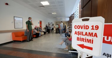 People wait for COVID-19 vaccination at a hospital in Kırklareli, northwestern Turkey, July 25, 2022. (AA PHOTO)