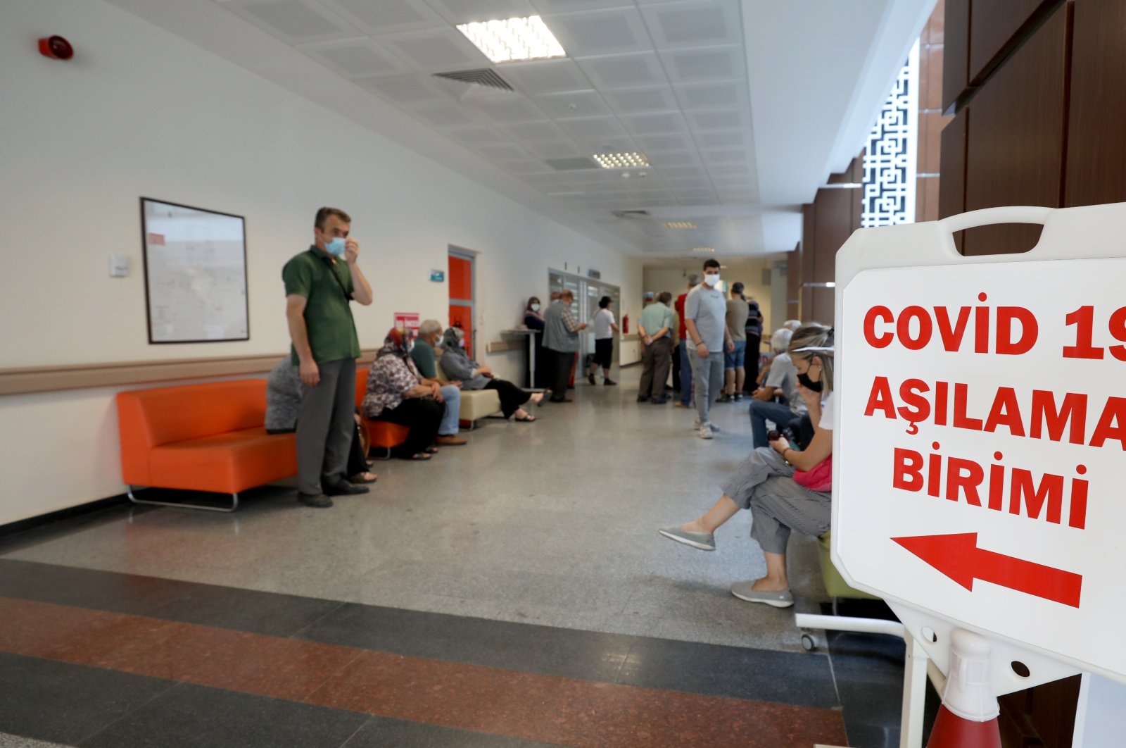 People wait for COVID-19 vaccination at a hospital in Kırklareli, northwestern Turkey, July 25, 2022. (AA PHOTO)