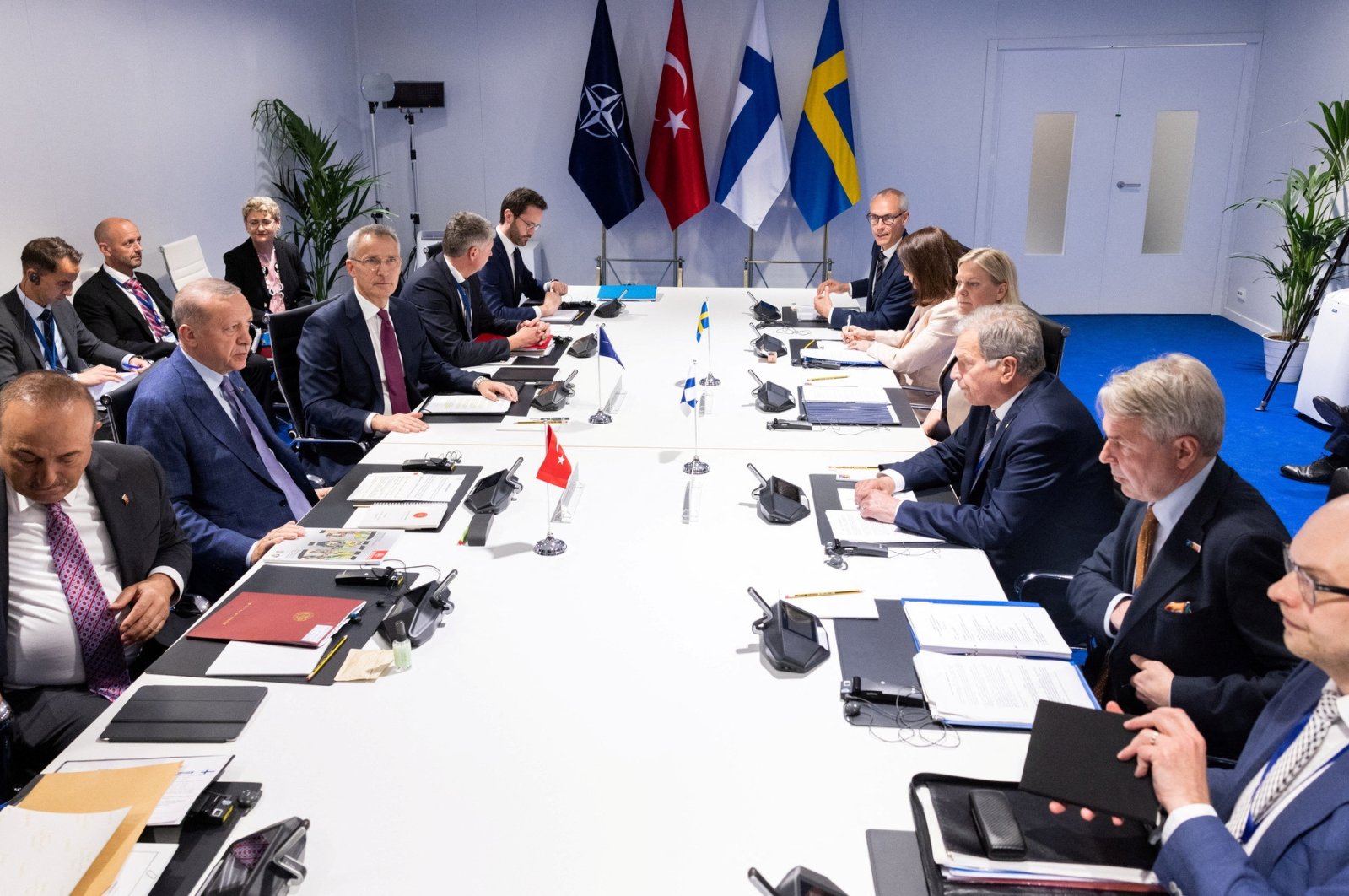 NATO Secretary-General Jens Stoltenberg, Turkish President Recep Tayyip Erdoğan, Swedish Prime Minister Magdalena Andersson and Finnish President Sauli Niinisto attend a trilateral meeting between Turkey, Finland and Sweden on the day of a NATO summit in Madrid, Spain, June 28, 2022. (REUTERS)