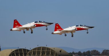 Two aircraft fly during a training session in Izmir, western Turkey, July 29, 2022. (AA PHOTO)