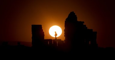 Photographer Bestami Boduk's model poses in the Zerzevan Castle in Diyarbakır, Turkey, July 27, 2022. (AA Photo)
